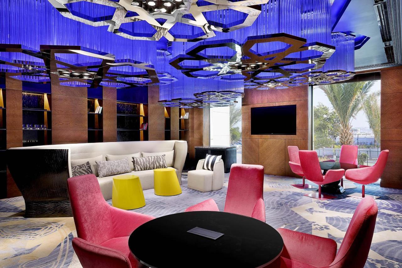 W Muscat Hotel Kültér fotó The W lounge at Beijing Capital International Airport