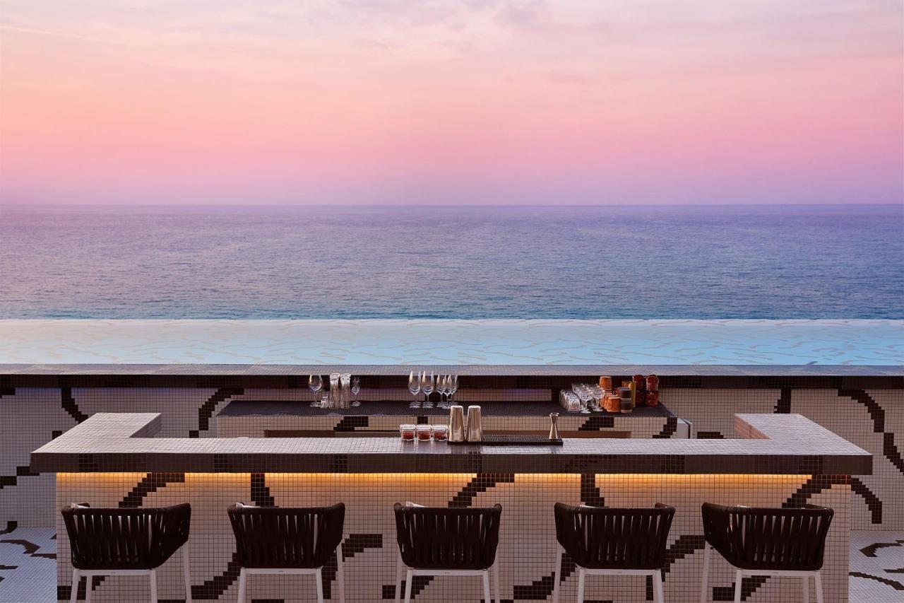 W Muscat Hotel Kültér fotó The Bar